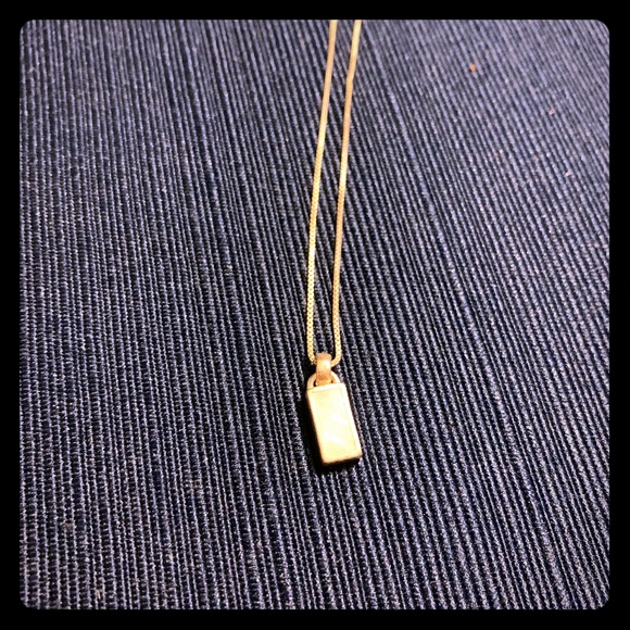 Jewelry - Silver necklace with white opalescent pendant.